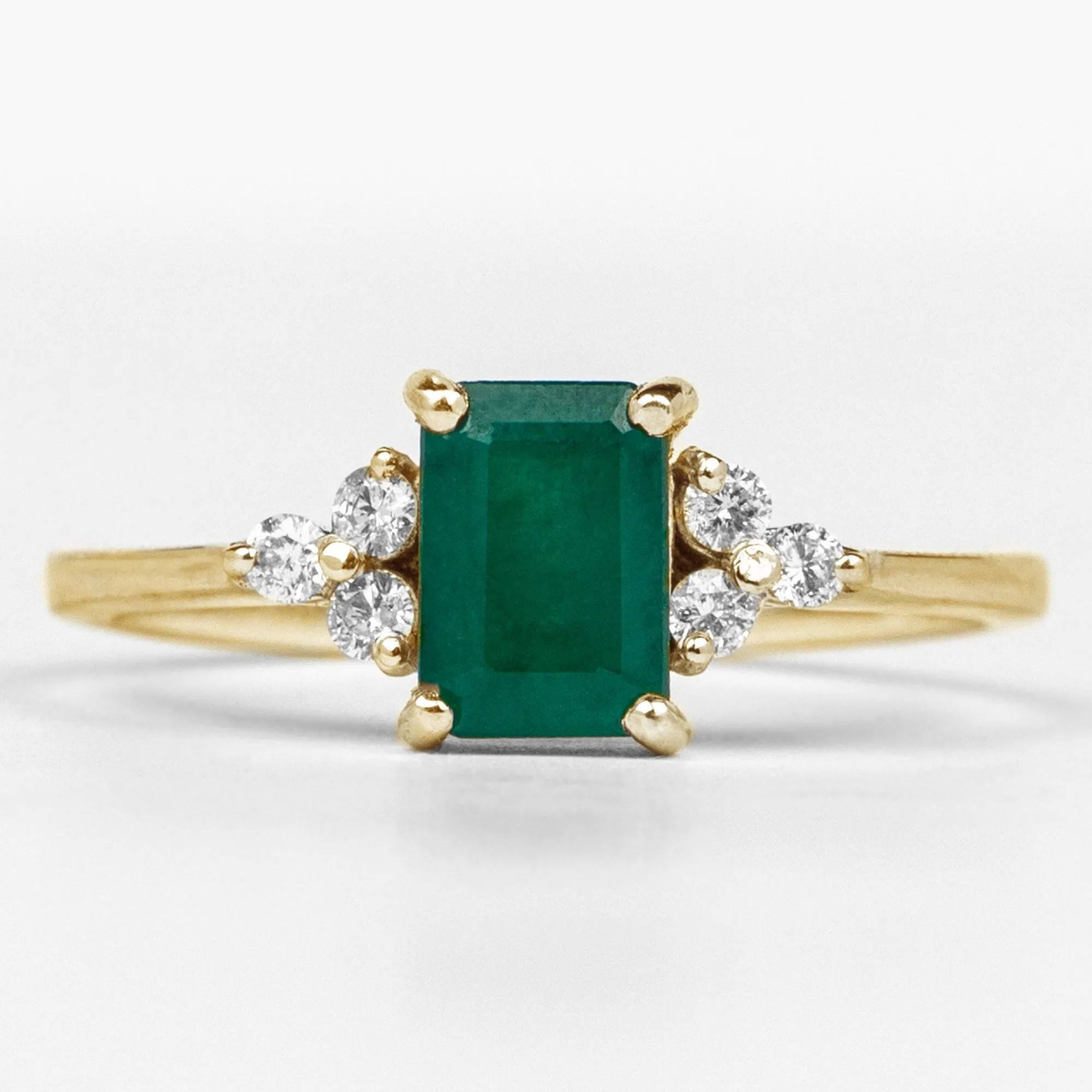 Octagon Cut Emerald Engagement Ring with Diamond Trio
