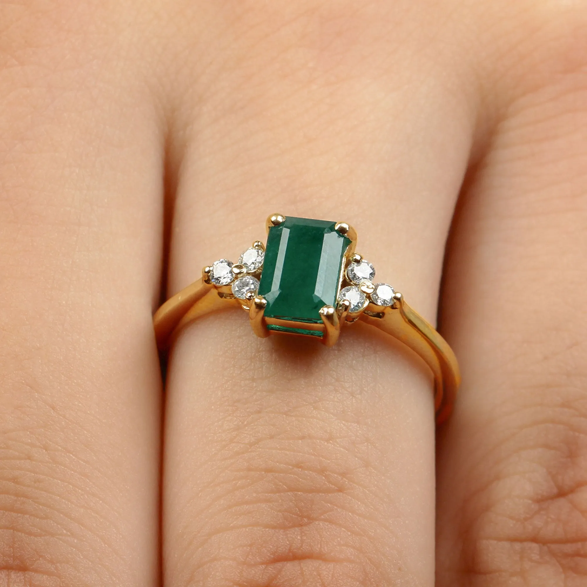 Octagon Cut Emerald Engagement Ring with Diamond Trio