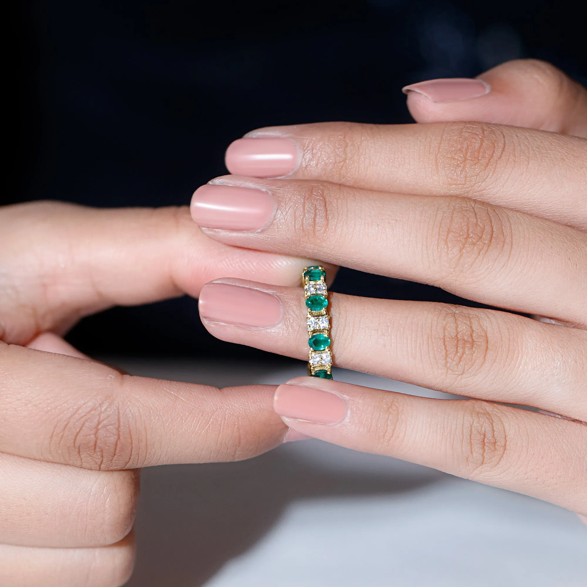 Oval Emerald and Moissanite Eternity Ring