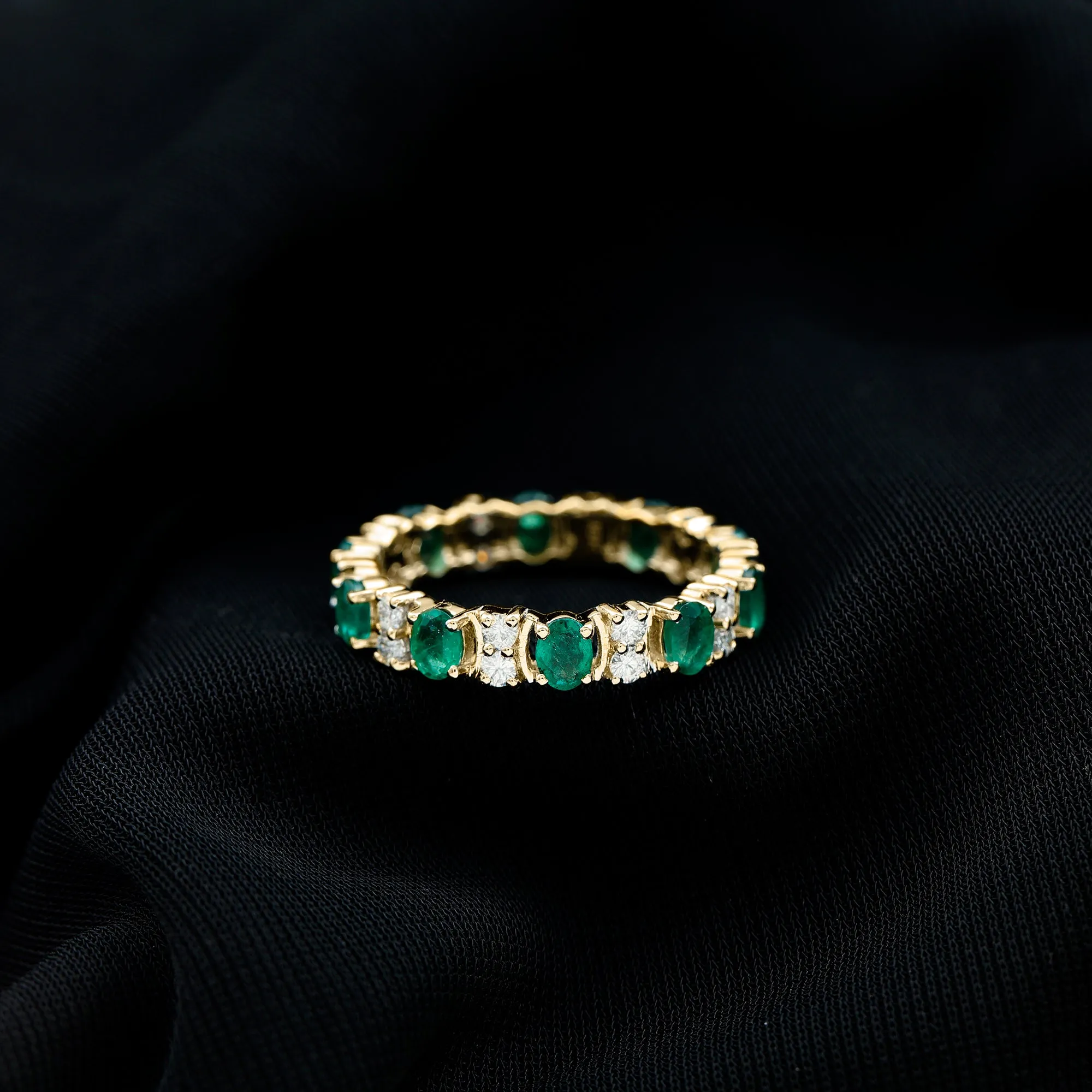 Oval Emerald and Moissanite Eternity Ring