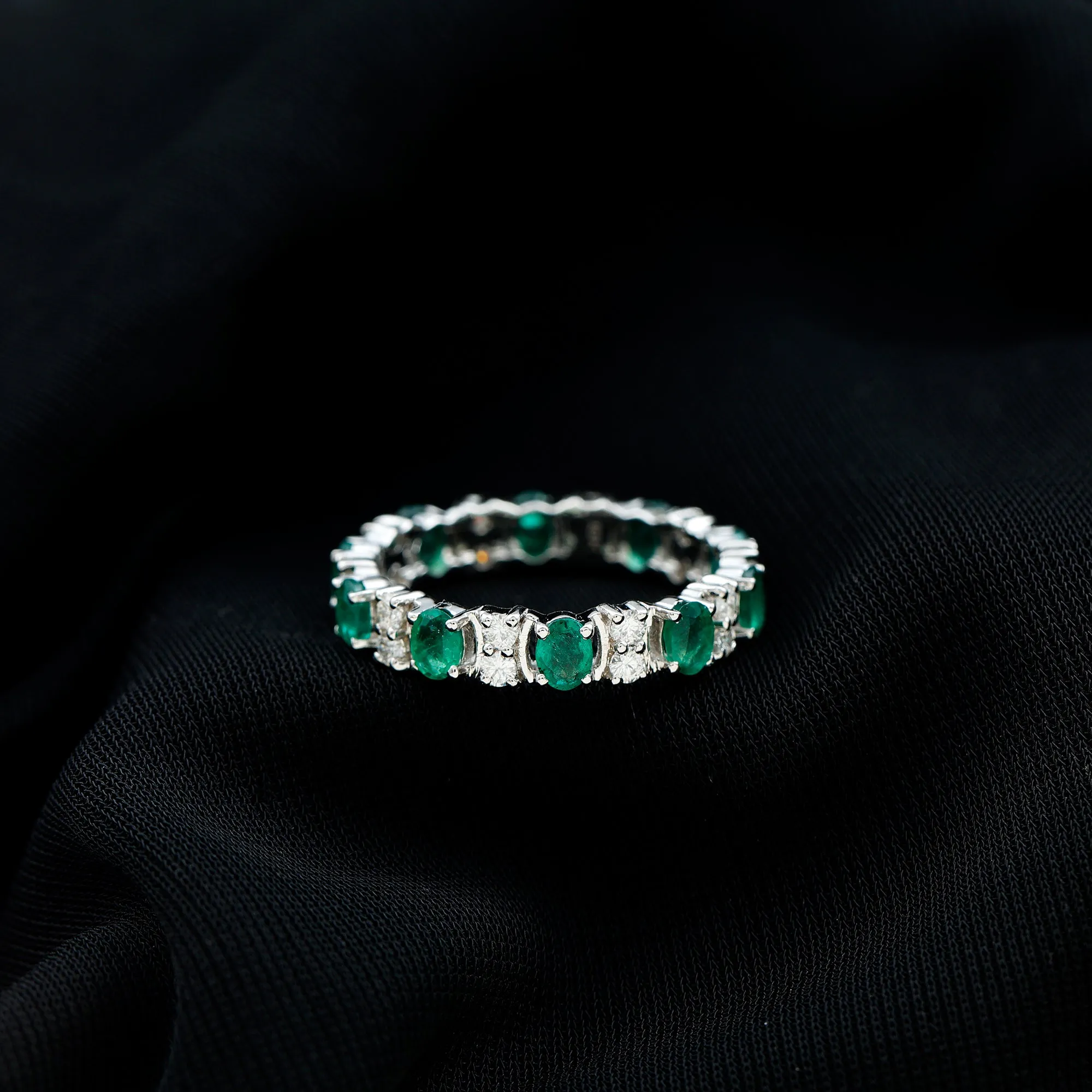 Oval Emerald and Moissanite Eternity Ring
