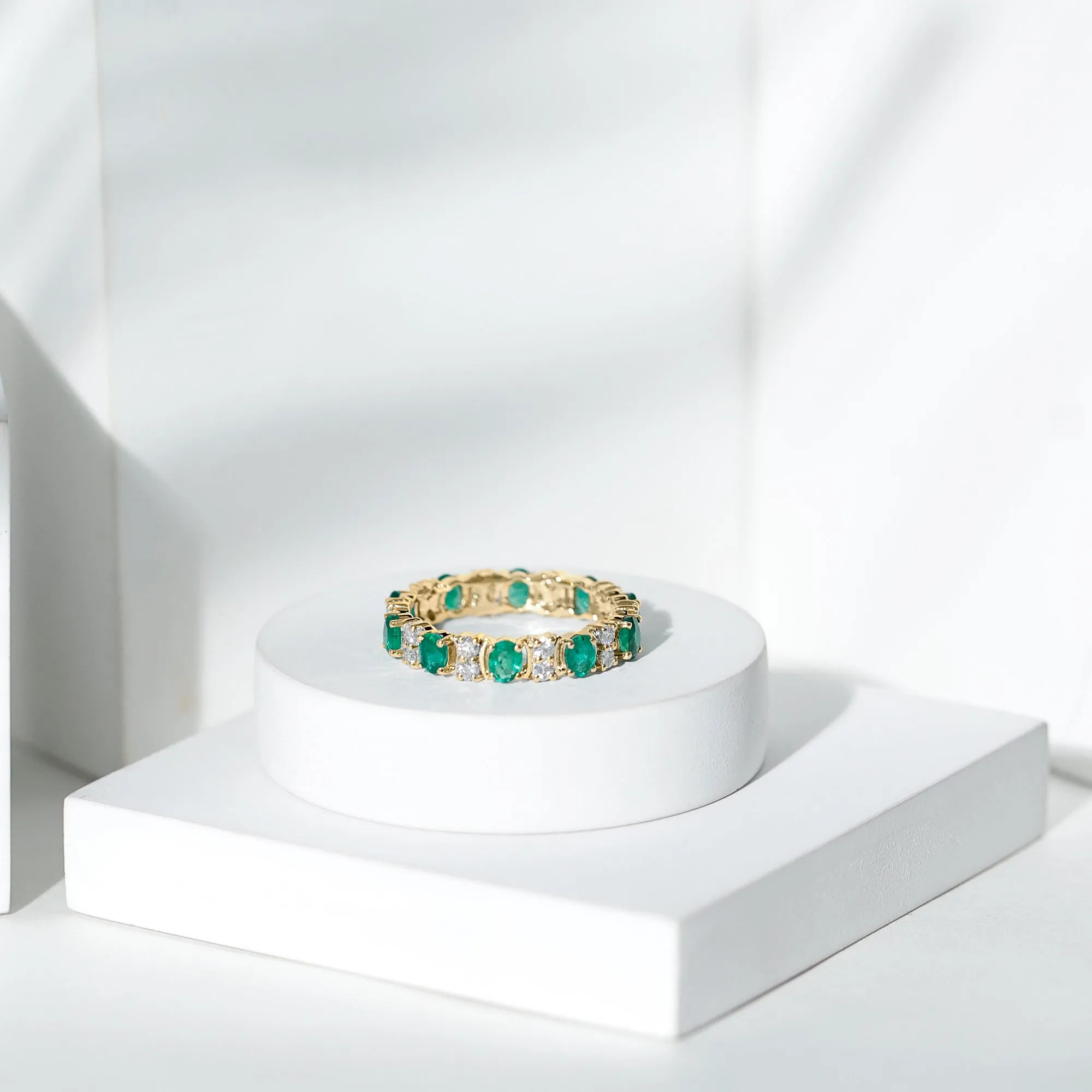 Oval Emerald and Moissanite Eternity Ring