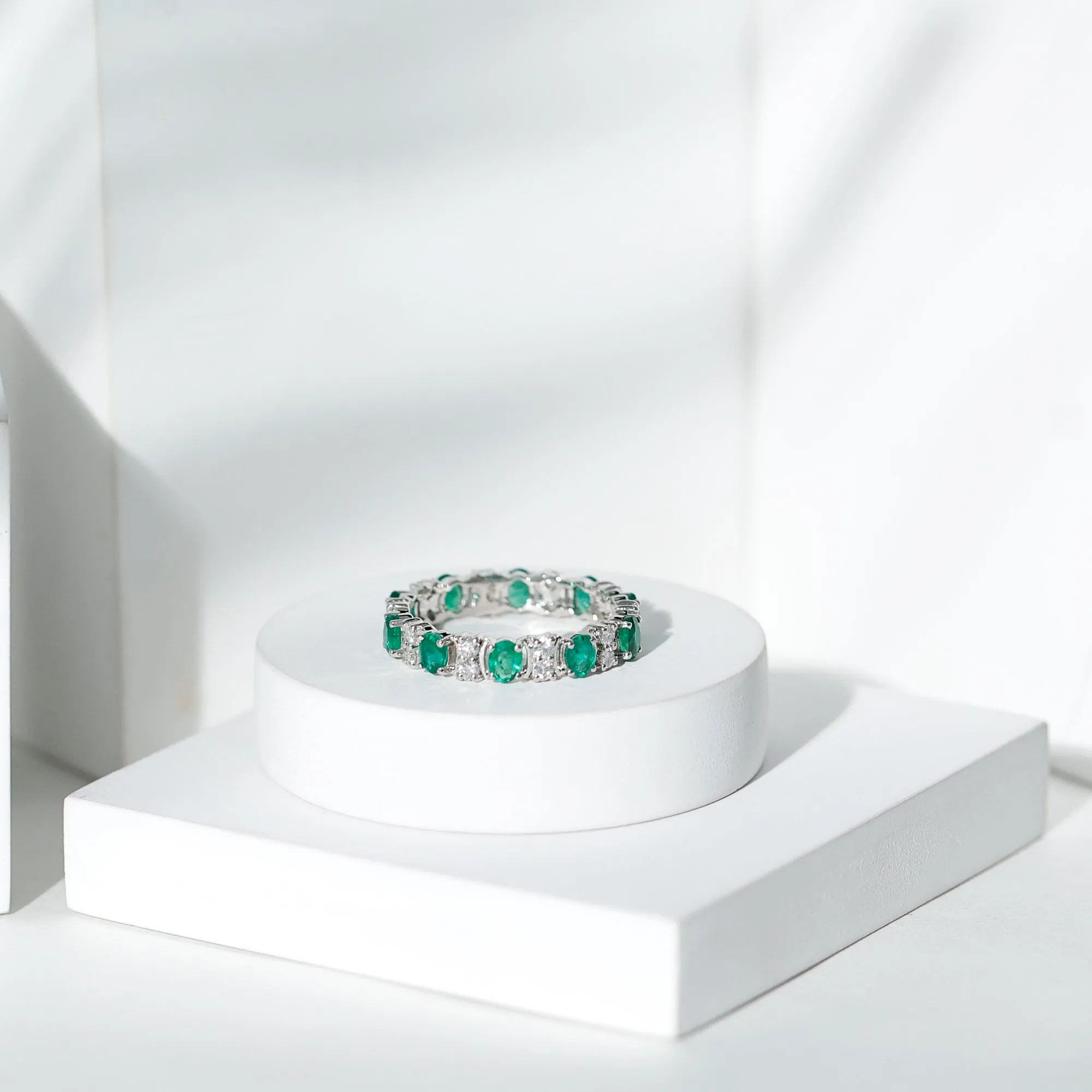 Oval Emerald and Moissanite Eternity Ring
