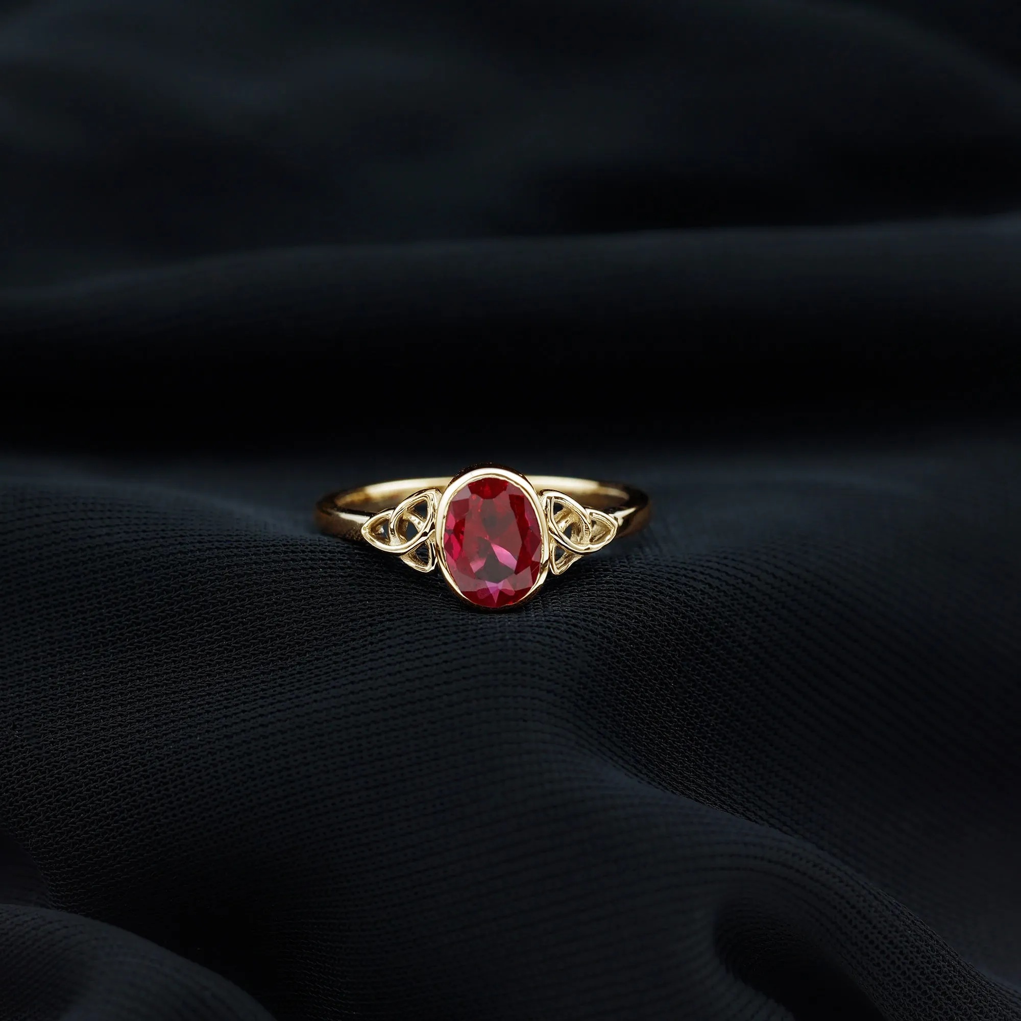 Oval Shape Lab Grown Ruby Solitaire Celtic Knot Ring