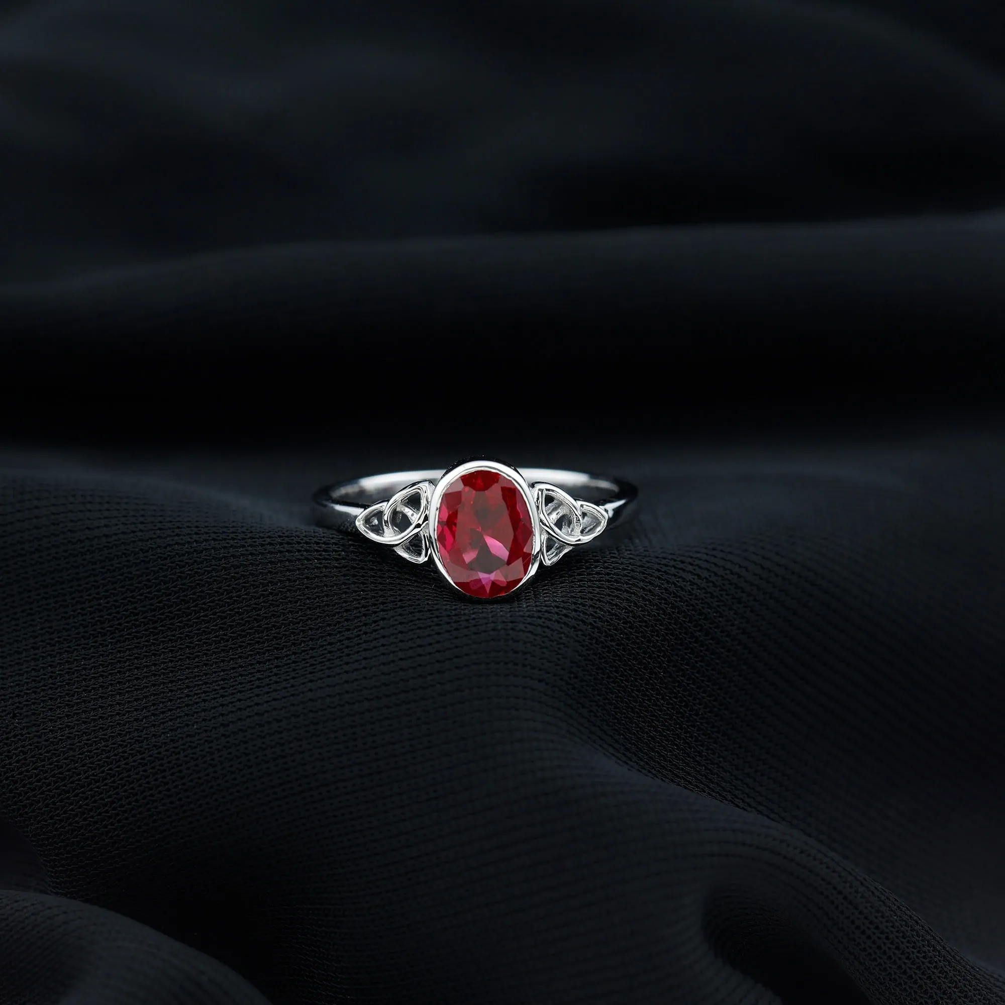 Oval Shape Lab Grown Ruby Solitaire Celtic Knot Ring